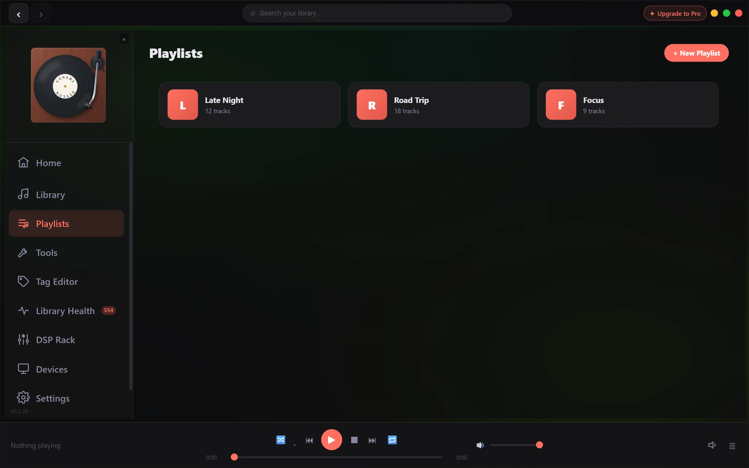 The Playlists page with three playlists listed as wide cards across the top: Late Night, 12 tracks; Road Trip, 18 tracks; and Focus, 9 tracks. Each card carries a square tile with the playlist's initial. A + New Playlist button sits at the top right, and Playlists is the selected item in the navigation rail down the left.